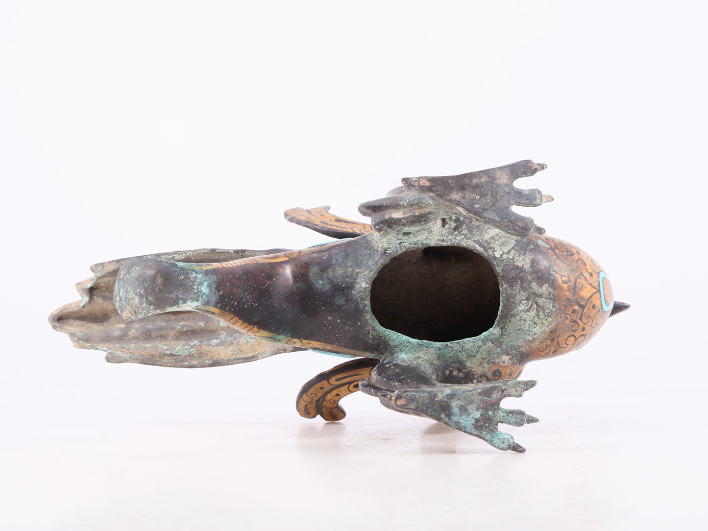 An exquisite bronze inlaid gold and turquoise phoenix ornament