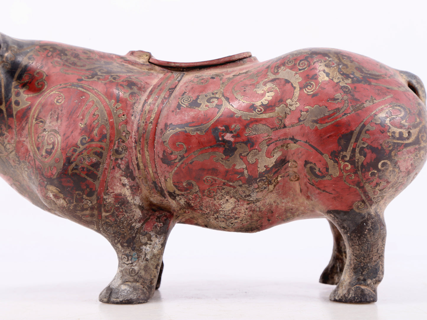 An exquisite bronze-inlaid silver rhinoceros ornament