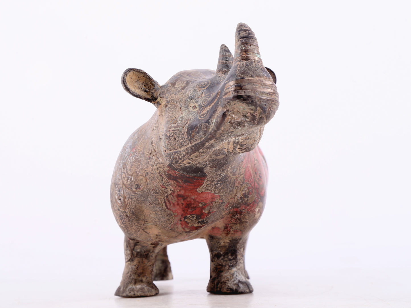 An exquisite bronze-inlaid silver rhinoceros ornament