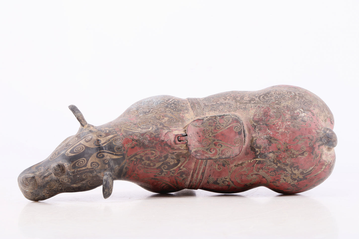 An exquisite bronze-inlaid silver rhinoceros ornament