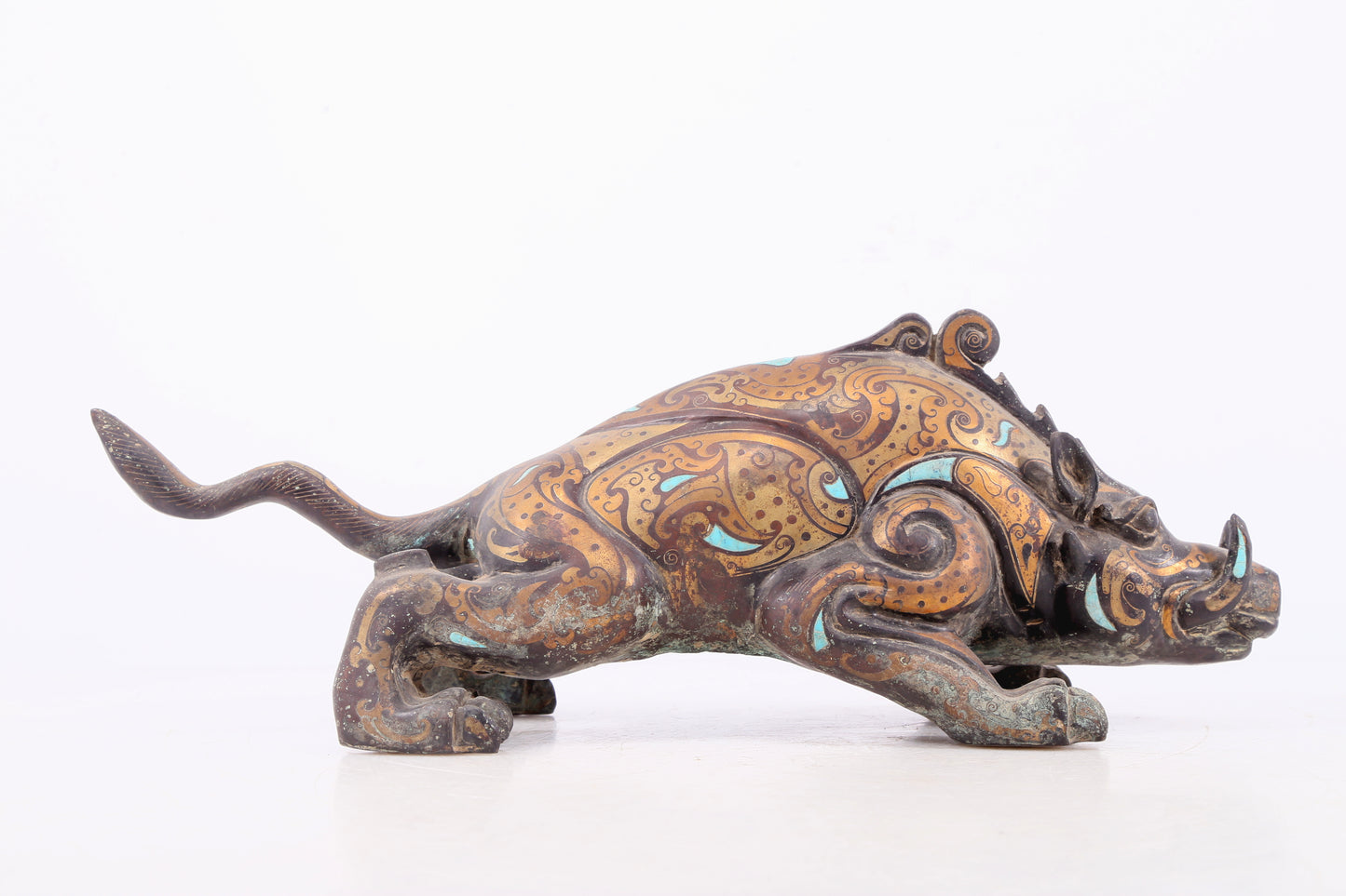 An exquisite bronze inlaid with gold and turquoise auspicious animal ornaments