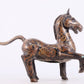 A pair of bronze inlaid gold and silver horse ornaments