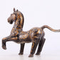 A pair of bronze inlaid gold and silver horse ornaments