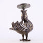 An exquisite bronze inlaid gold and silver candlestick with auspicious animals