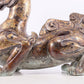 An exquisite bronze inlaid gold and silver auspicious animal ornament