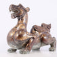 An exquisite bronze inlaid gold and silver auspicious animal ornament