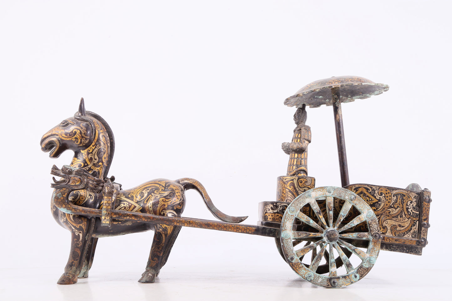 An exquisite bronze inlaid gold and silver carriage ornament