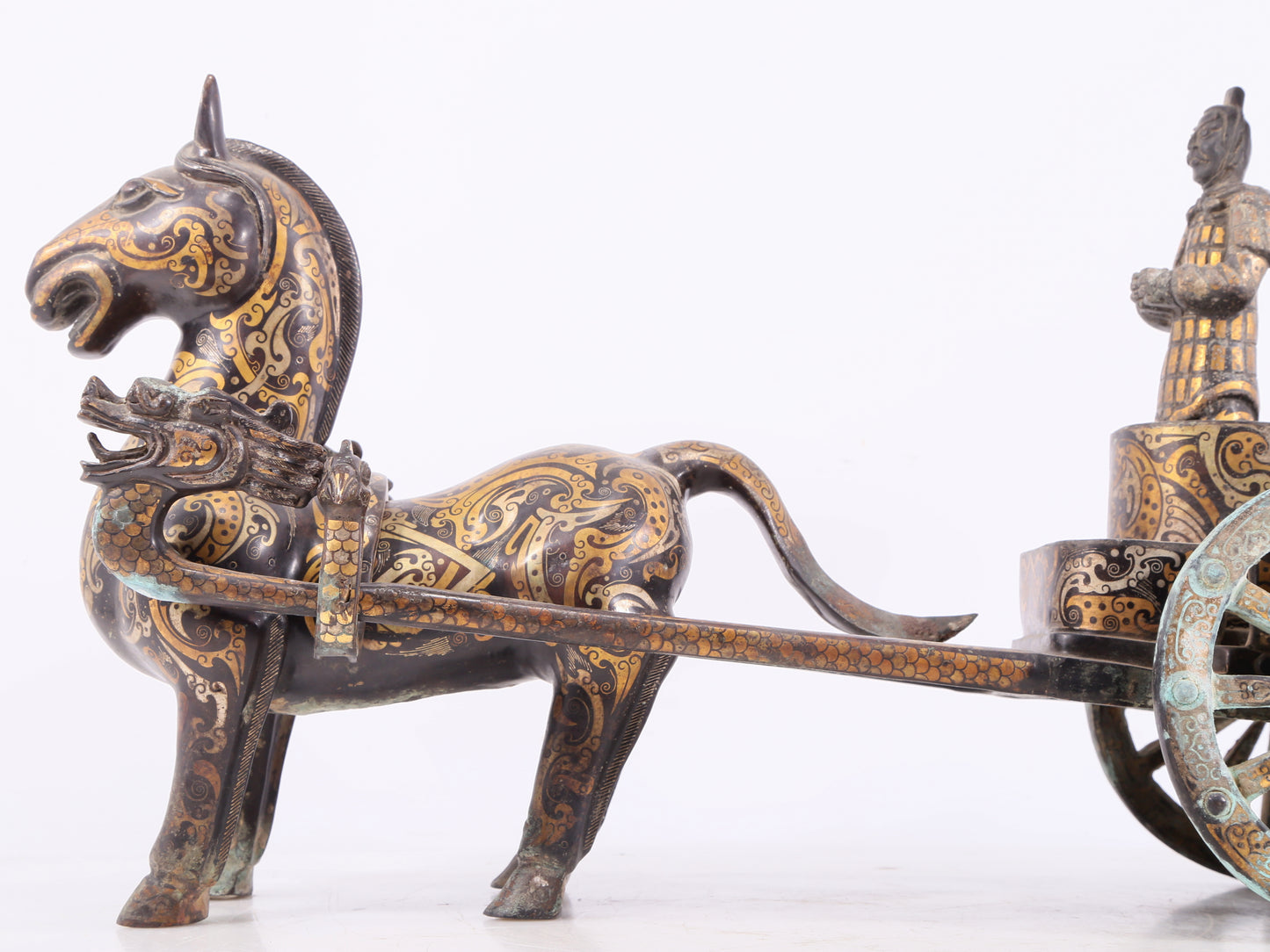 An exquisite bronze inlaid gold and silver carriage ornament