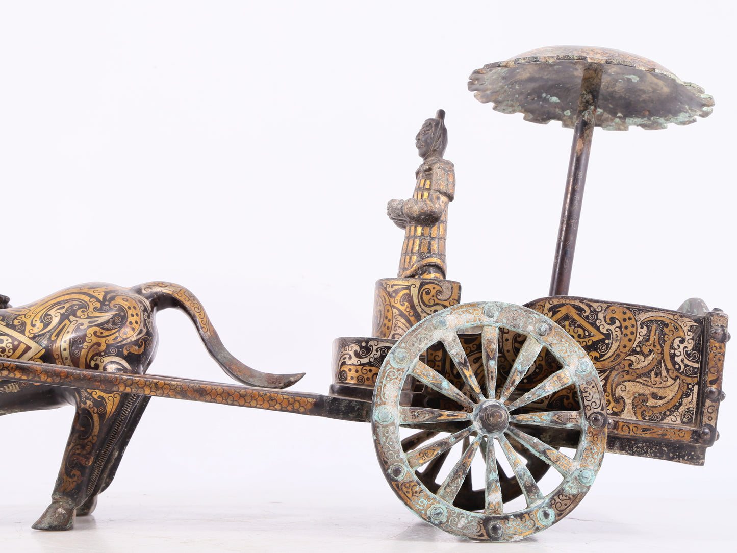 An exquisite bronze inlaid gold and silver carriage ornament