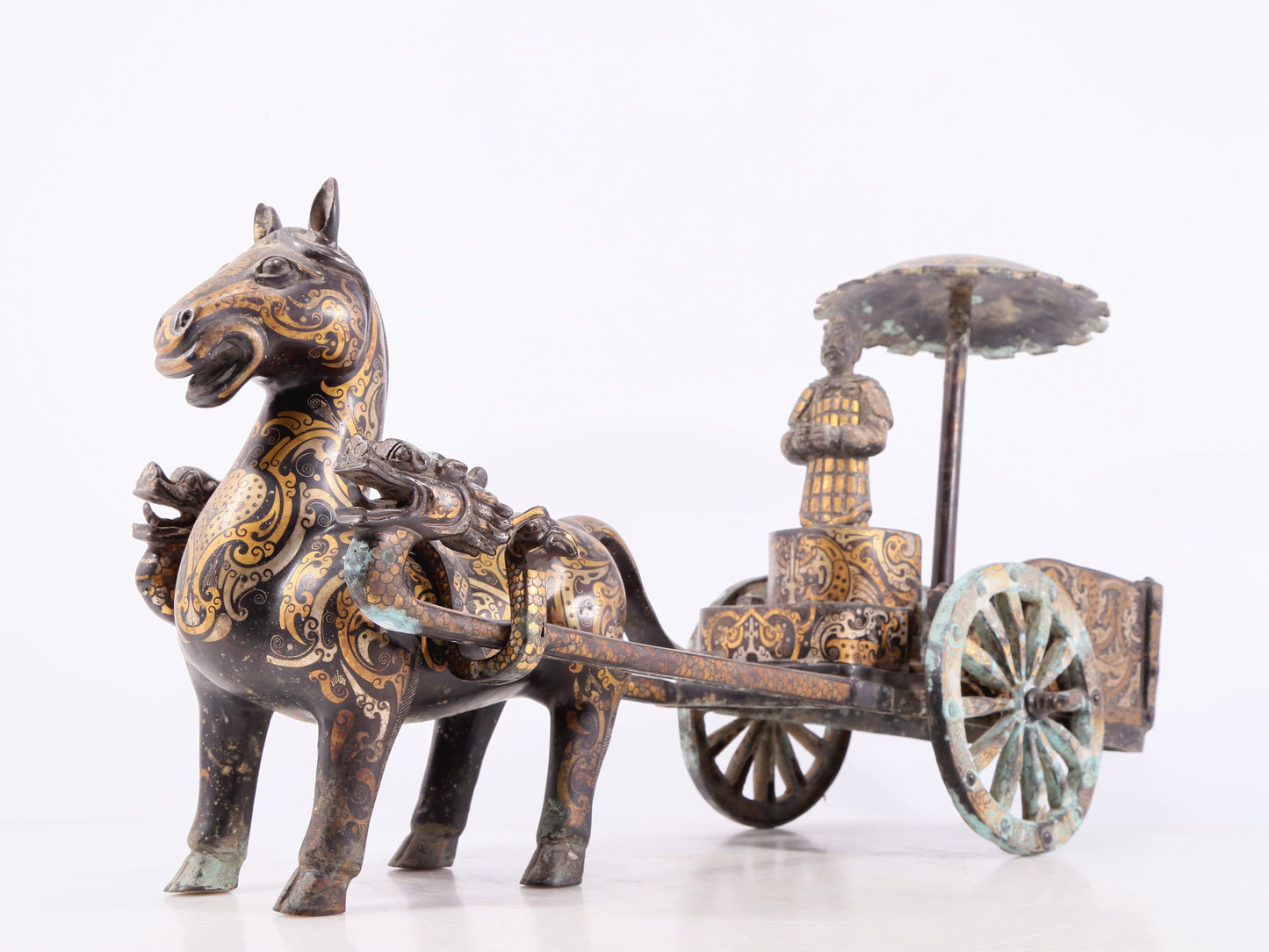 An exquisite bronze inlaid gold and silver carriage ornament