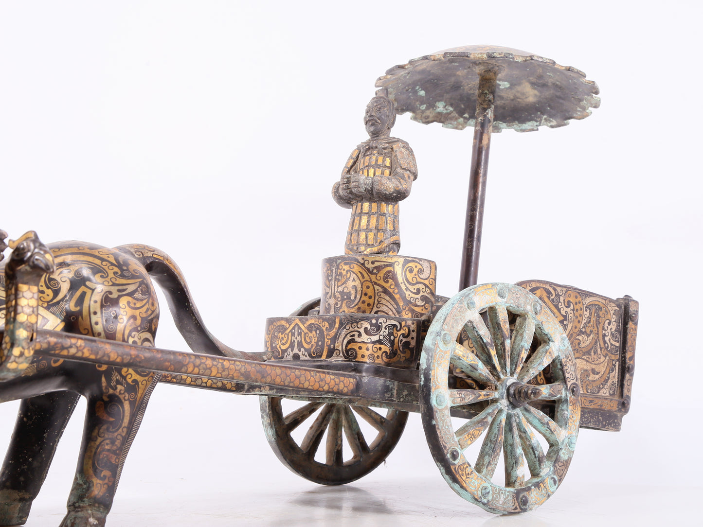 An exquisite bronze inlaid gold and silver carriage ornament