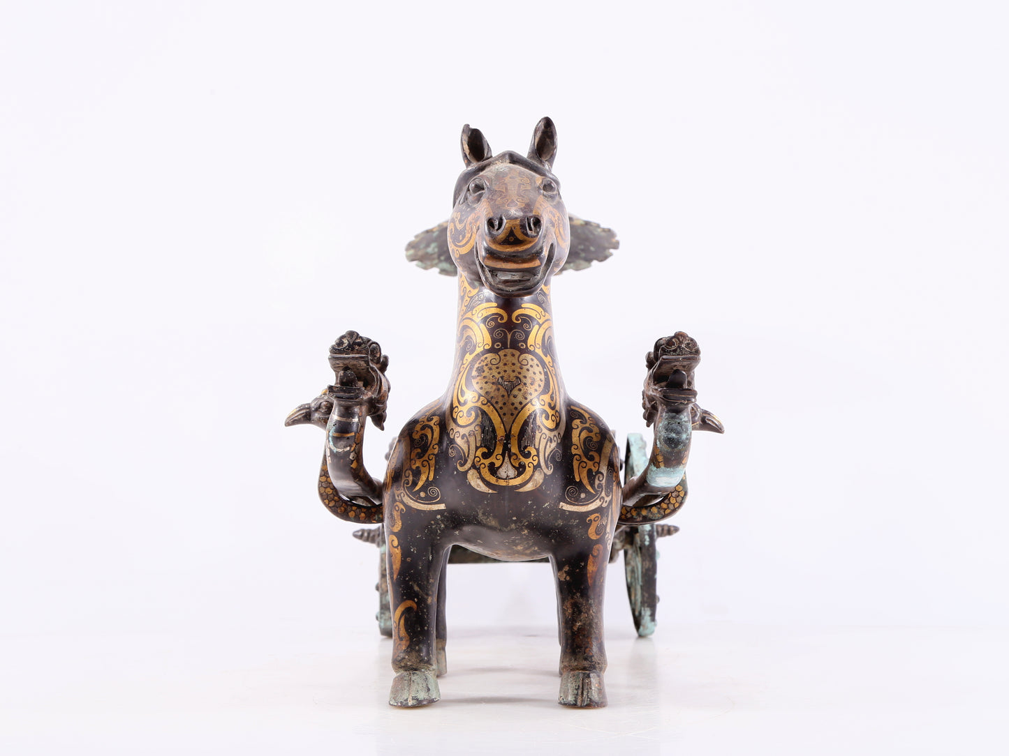 An exquisite bronze inlaid gold and silver carriage ornament