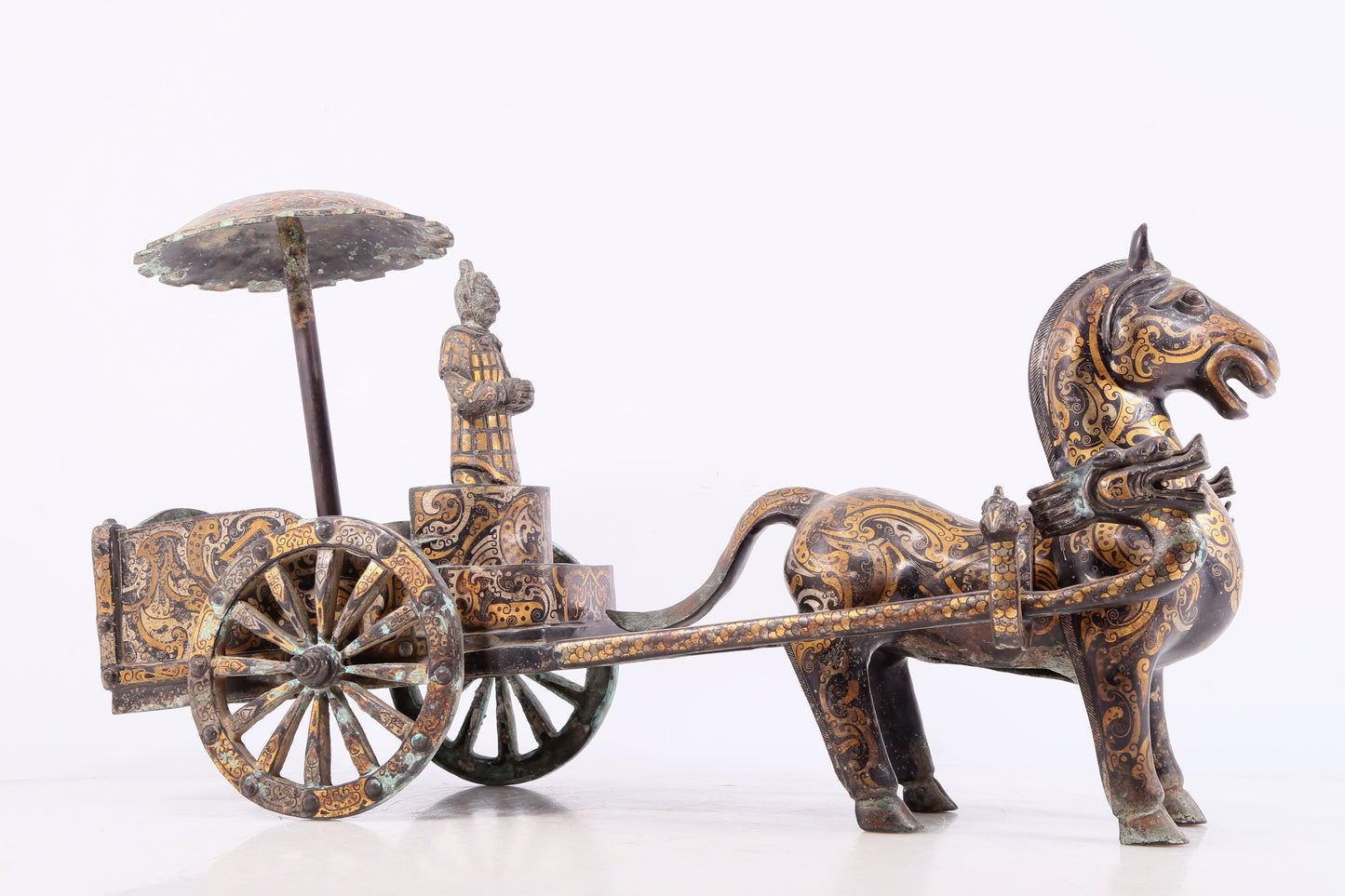 An exquisite bronze inlaid gold and silver carriage ornament