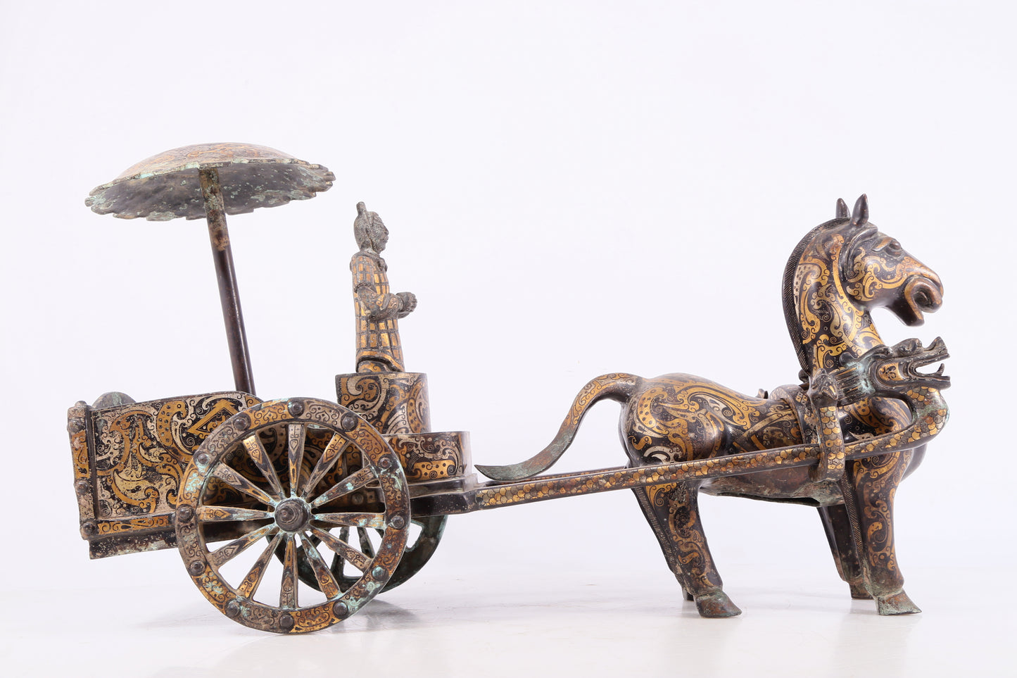 An exquisite bronze inlaid gold and silver carriage ornament