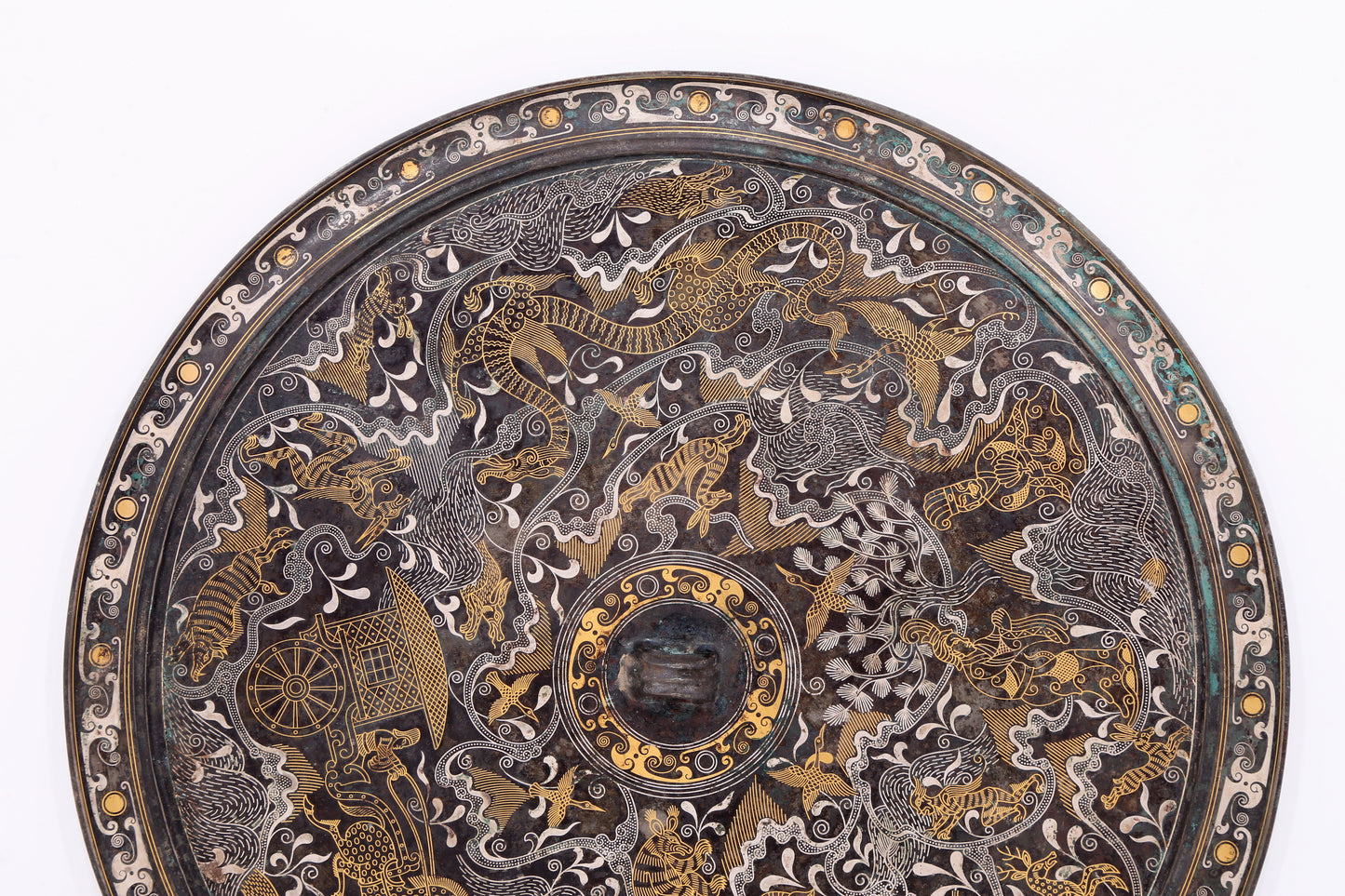 An exquisite bronze inlaid gold and silver mirror with auspicious animal patterns