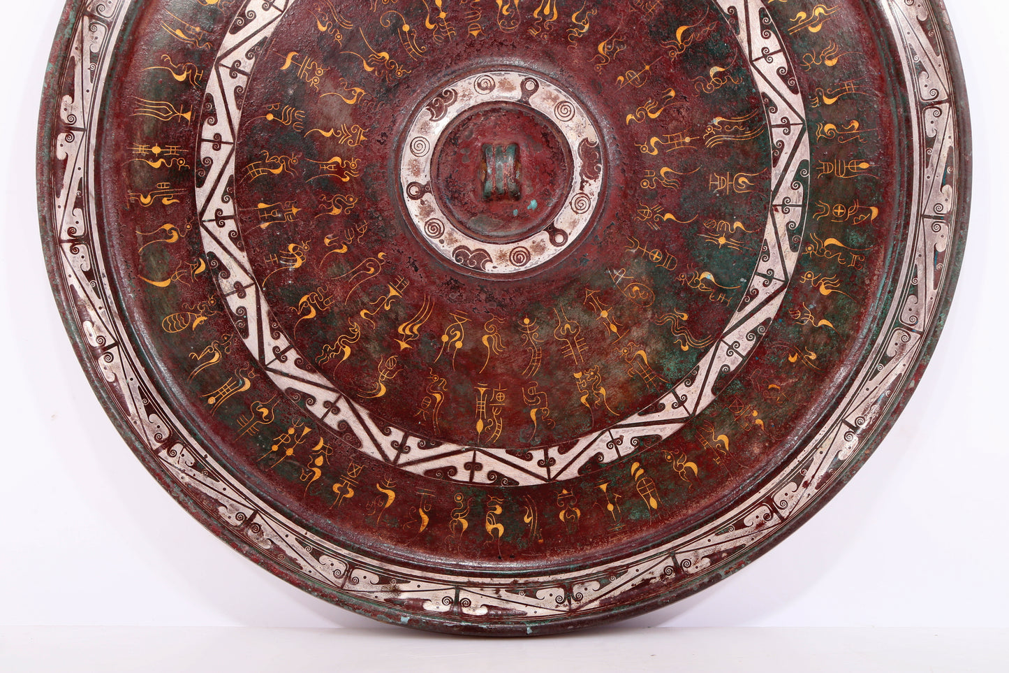 An exquisite bronze inlaid gold and silver auspicious cloud pattern round mirror