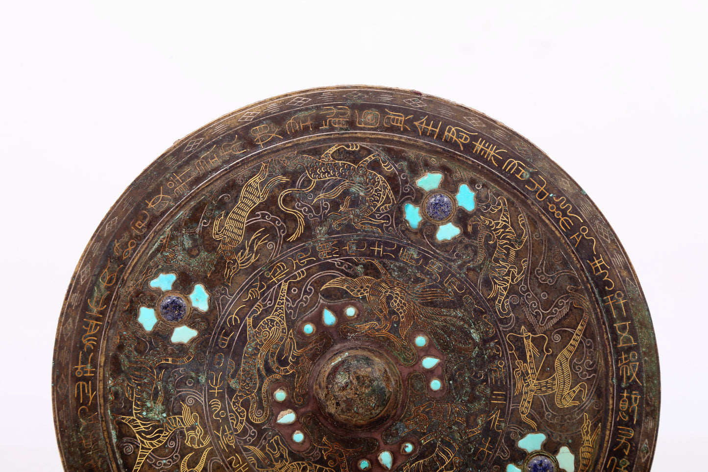 An exquisite bronze inlaid gold and silver round mirror with auspicious animal patterns