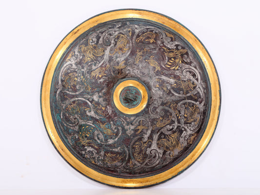 A Magnificent Bronze Gold& Silver-Mounted 'Auspicious Beast' Mirror