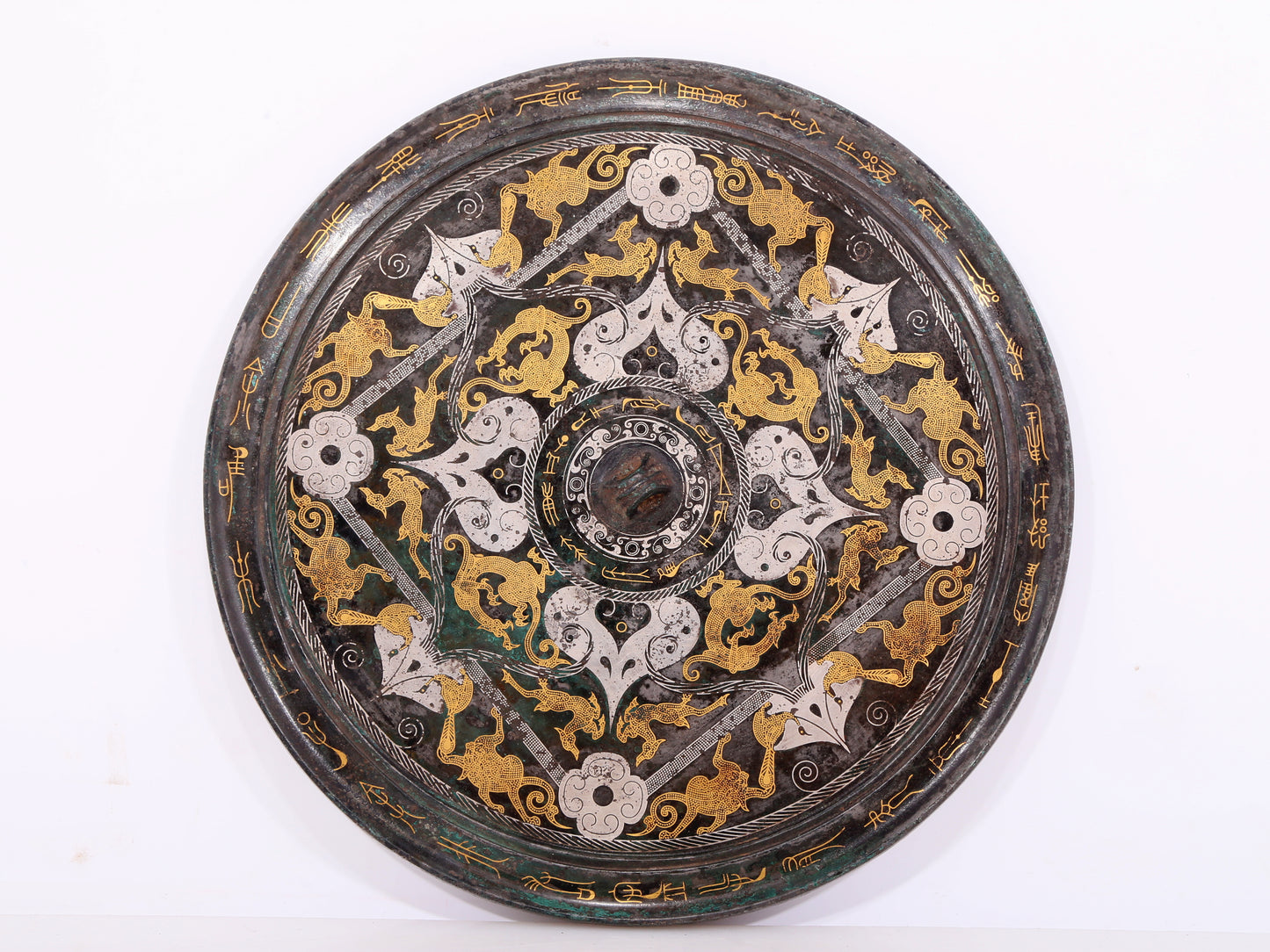 An exquisite bronze inlaid gold and silver round mirror with auspicious animal patterns