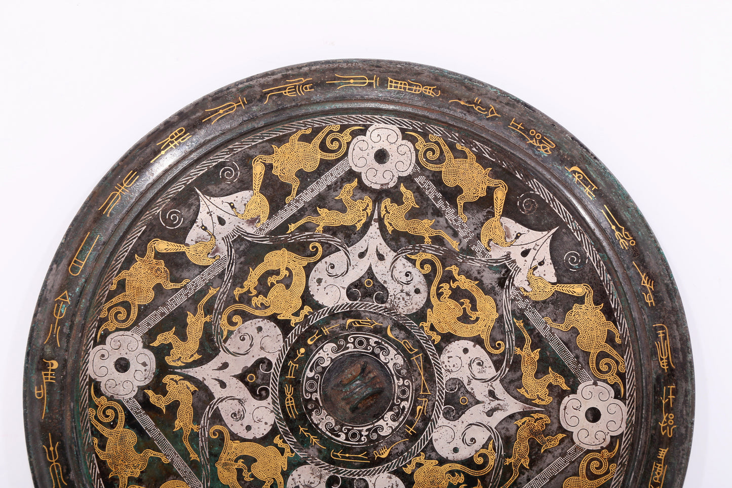 An exquisite bronze inlaid gold and silver round mirror with auspicious animal patterns