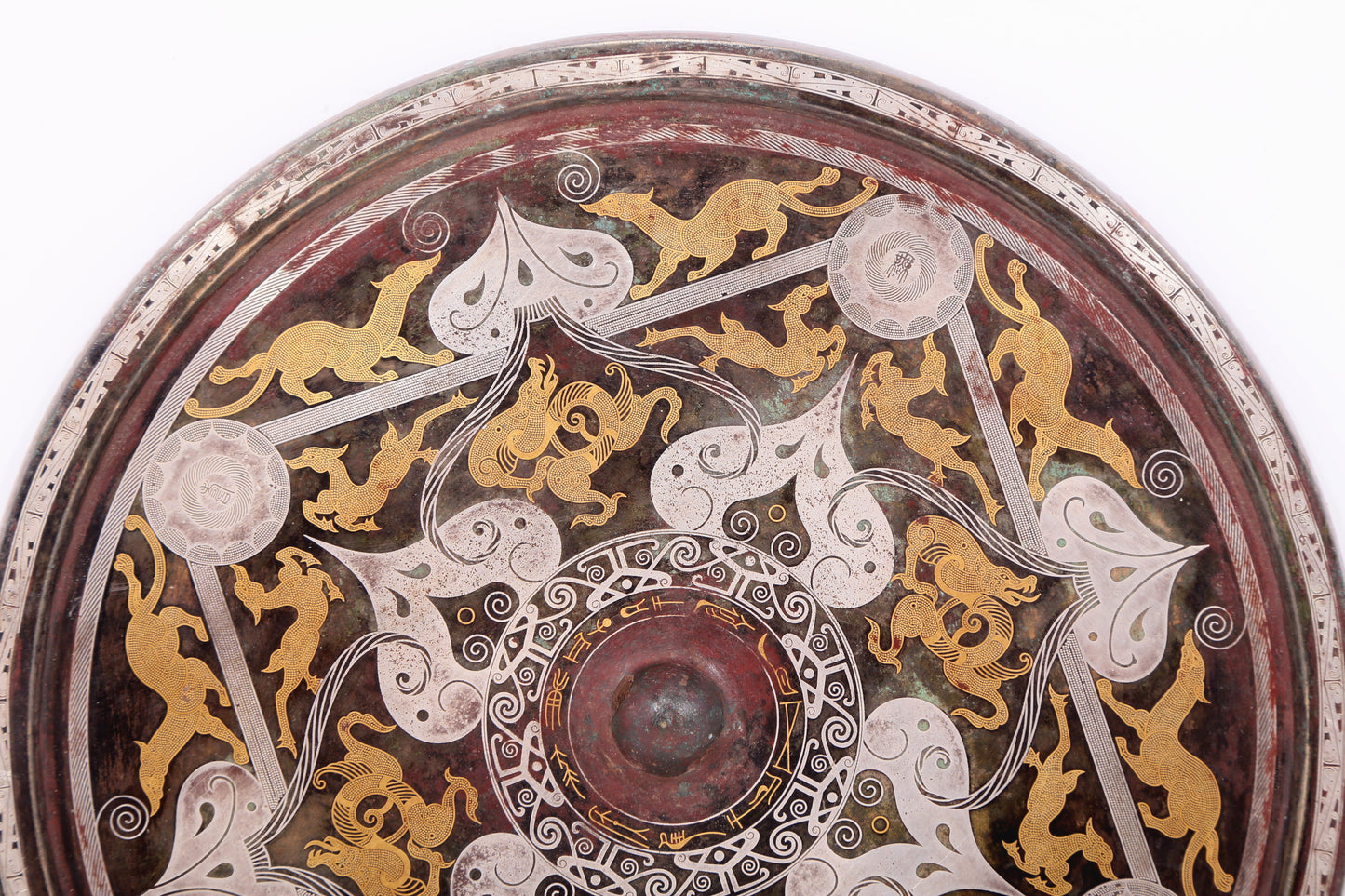 A Magnificent Bronze Gold& Silver-Mounted 'Auspicious Beast' Mirror