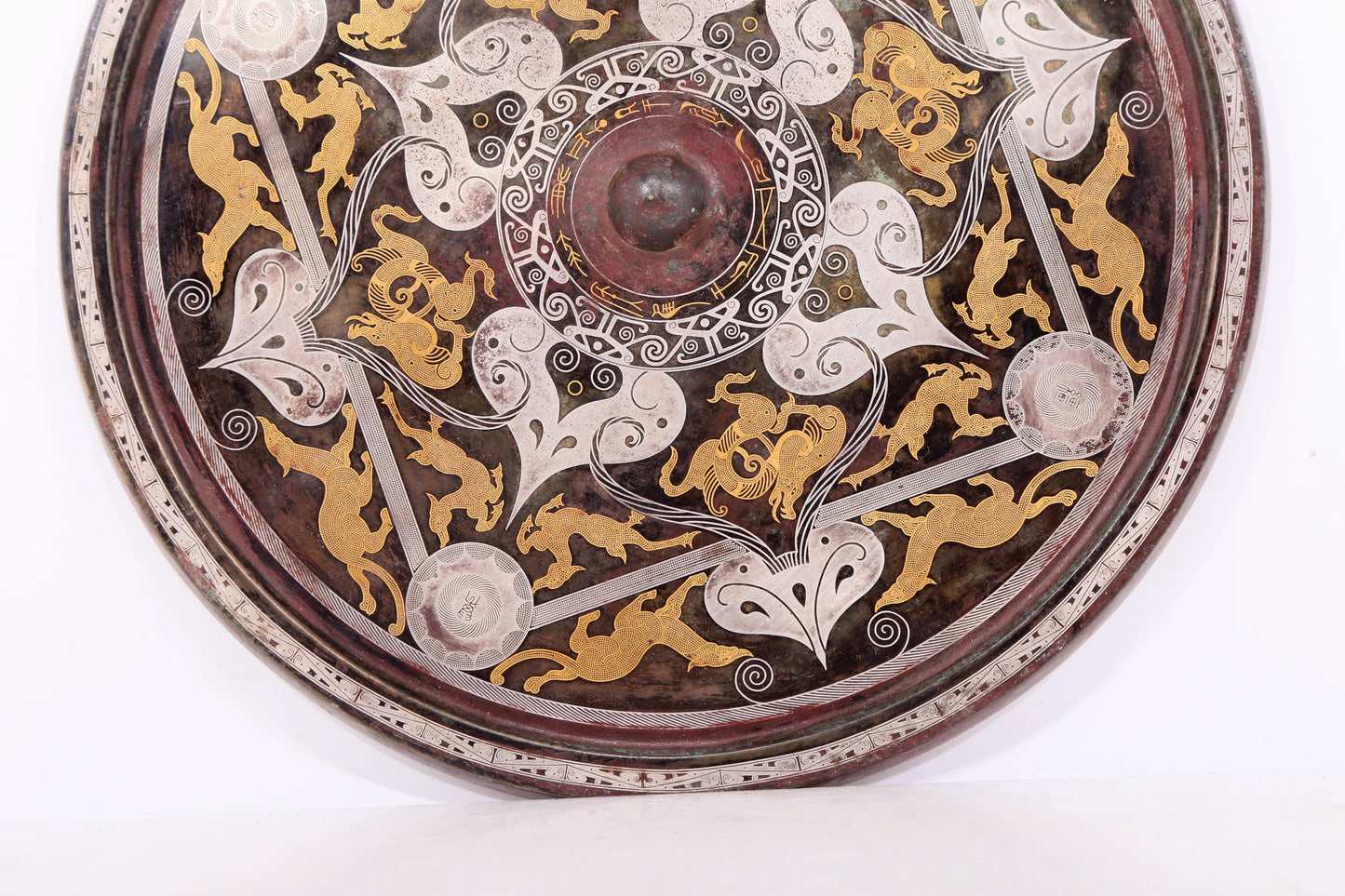 A Magnificent Bronze Gold& Silver-Mounted 'Auspicious Beast' Mirror