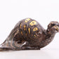 An exquisite bronze inlaid gold and silver bird ornament