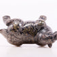 An exquisite bronze inlaid gold and silver auspicious animal ornament