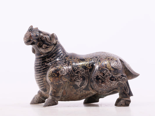 An exquisite bronze inlaid gold and silver auspicious animal ornament