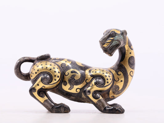 An exquisite bronze inlaid gold and silver leopard ornament