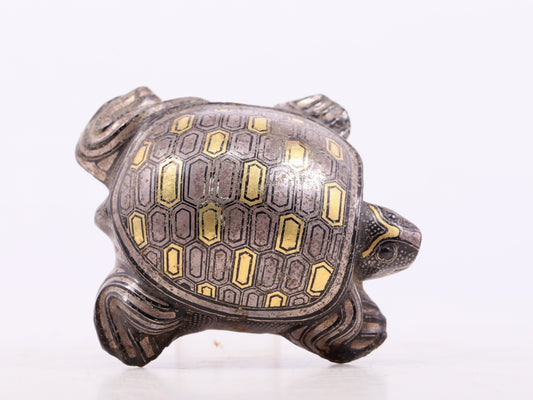 An exquisite bronze inlaid gold and silver turtle ornament