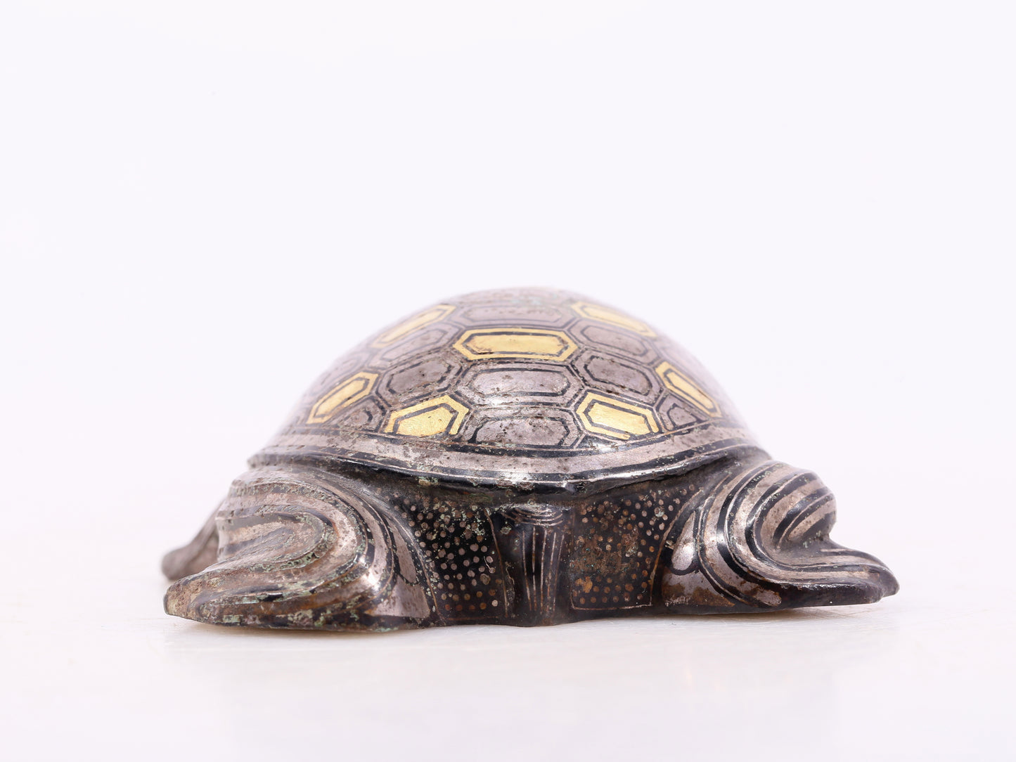 An exquisite bronze inlaid gold and silver turtle ornament