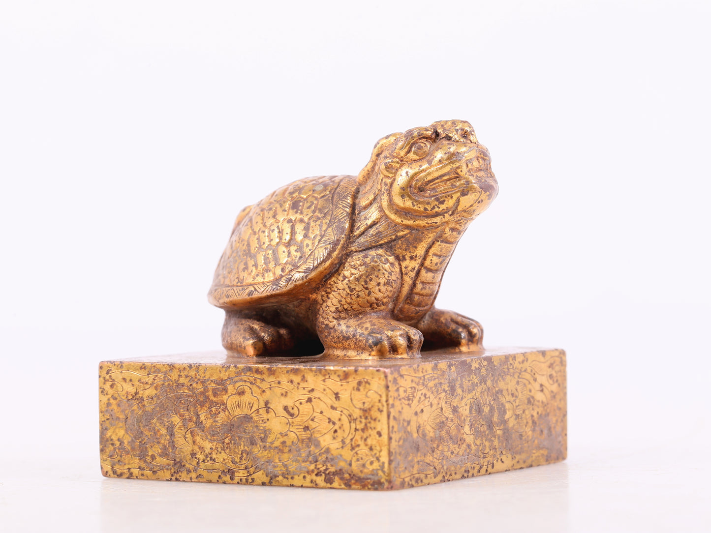 An exquisite gilt bronze animal seal