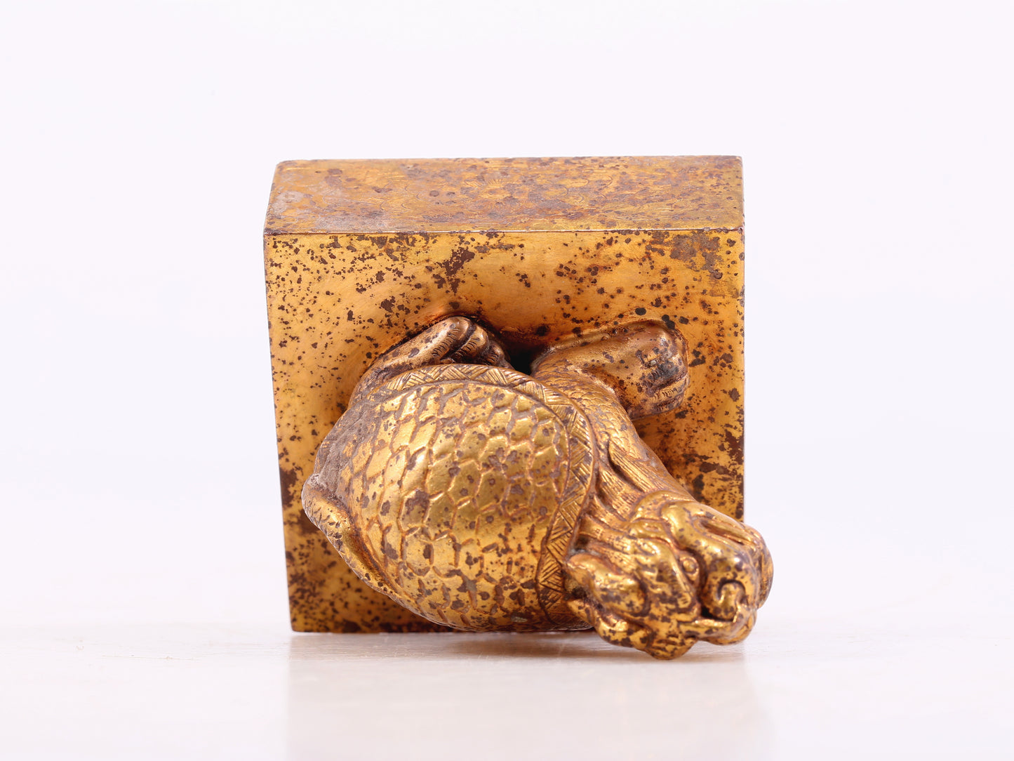 An exquisite gilt bronze animal seal