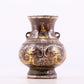 A pair of exquisite bronze amphora inlaid with gold and silver flowers and birds