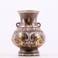 A pair of exquisite bronze amphora inlaid with gold and silver flowers and birds