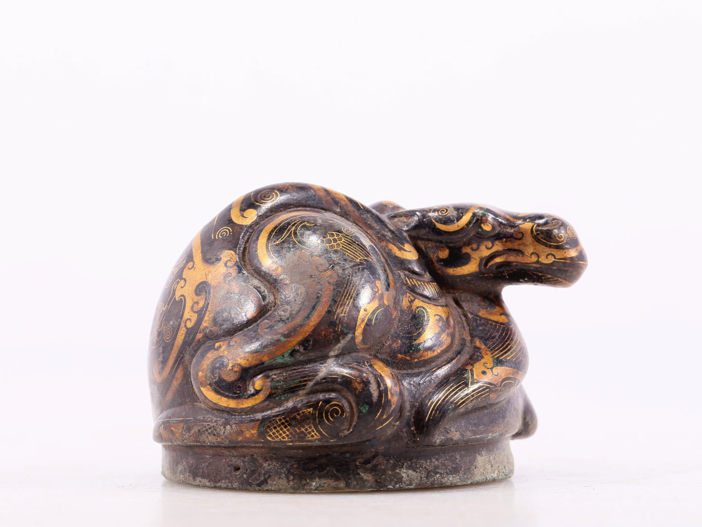 An exquisite bronze-inlaid auspicious animal ornament