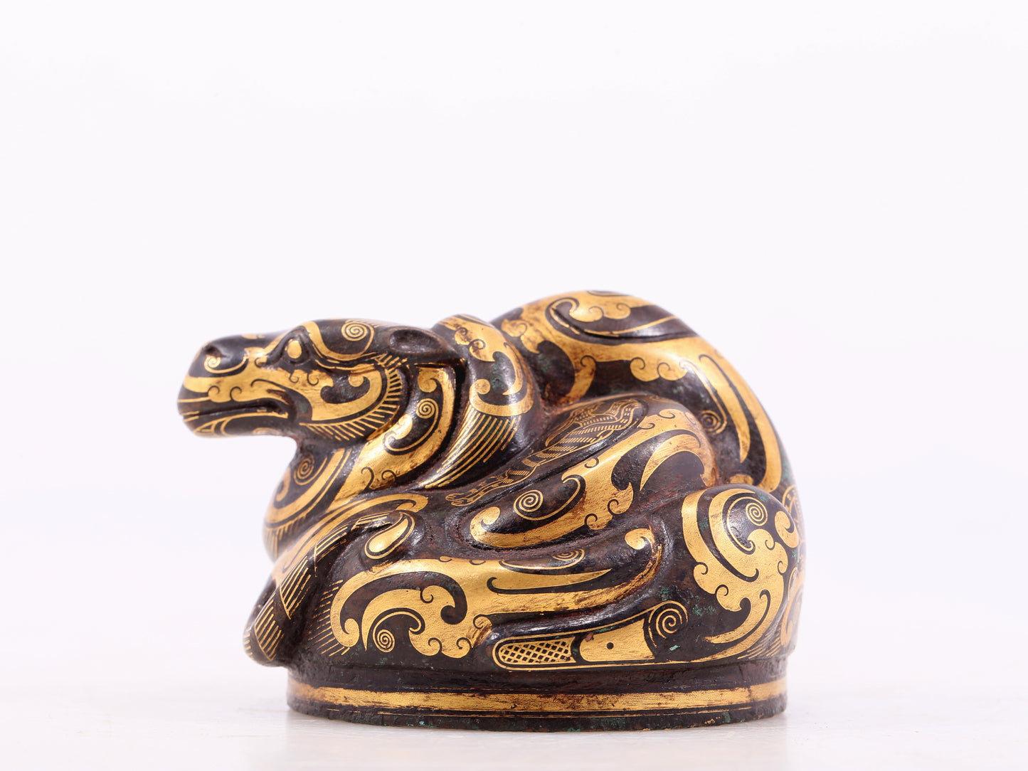 An exquisite bronze-inlaid auspicious animal ornament