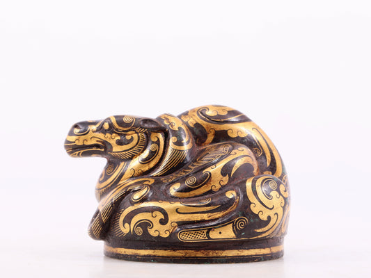 An exquisite bronze-inlaid auspicious animal ornament