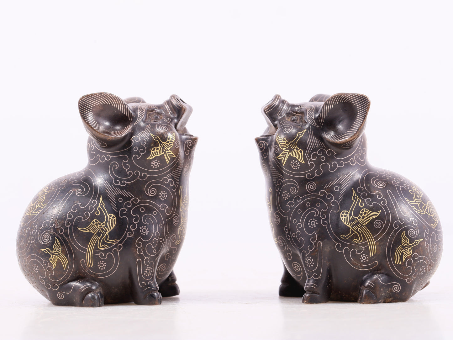 An Archaic Pair Of Bronze Gold& Silver-Mounted Boar