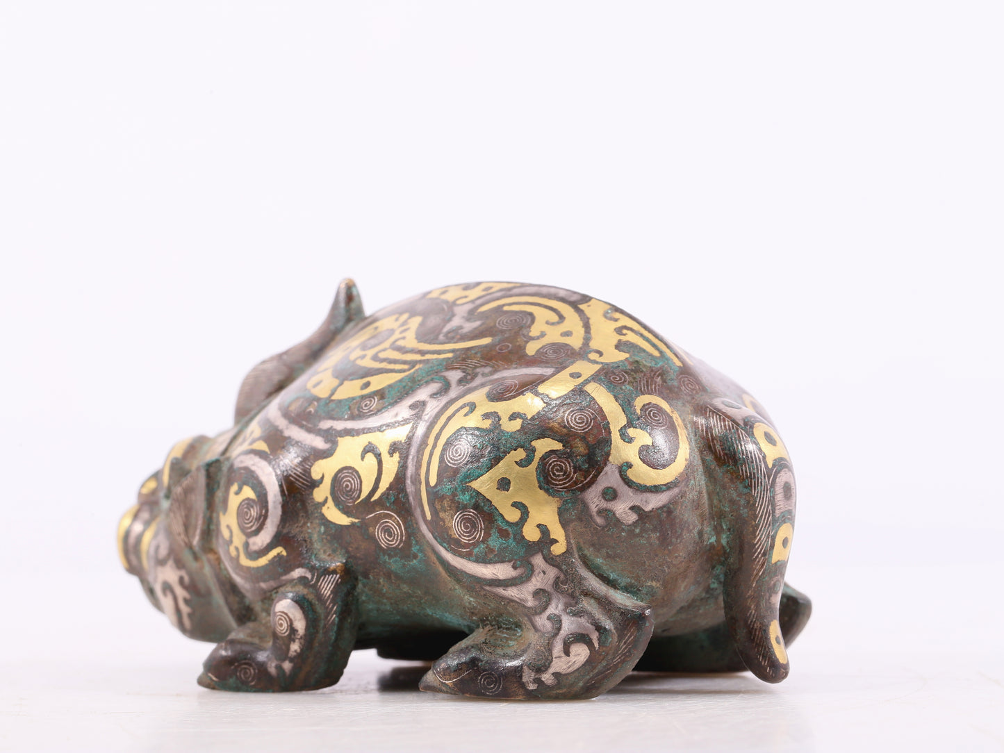 A Marvelous Bronze Gold& Silver-Mounted Auspicious Beast