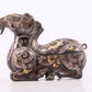 An Archaic Bronze Gold& Silver-Mounted Ram-Form Candlestick