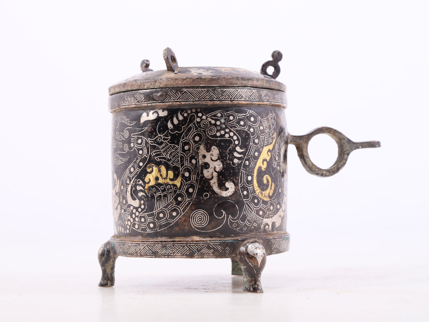 A pair of exquisite bronze inlaid gold and silver auspicious clouds and dragon pattern tripod jars with lids