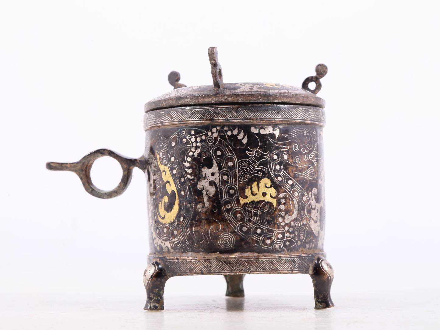 A pair of exquisite bronze inlaid gold and silver auspicious clouds and dragon pattern tripod jars with lids