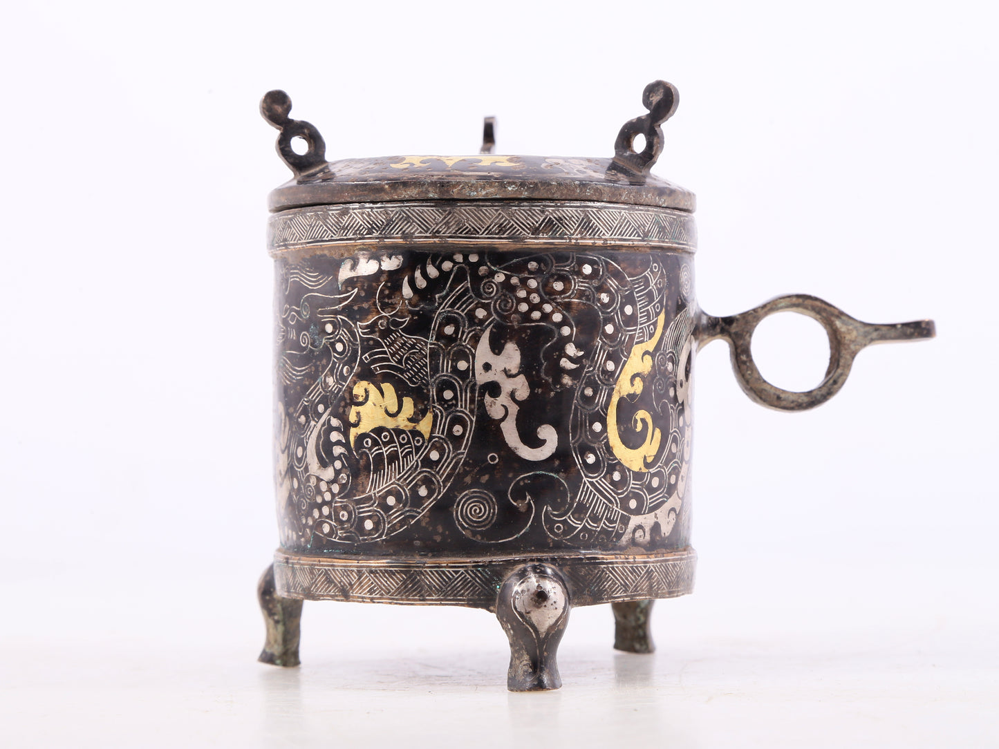 A pair of exquisite bronze inlaid gold and silver auspicious clouds and dragon pattern tripod jars with lids