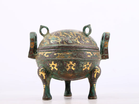 An exquisite bronze inlaid with gold and auspicious animal patterns with two ears and three legs with lid