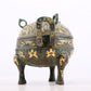 An exquisite bronze inlaid with gold and auspicious animal patterns with two ears and three legs with lid