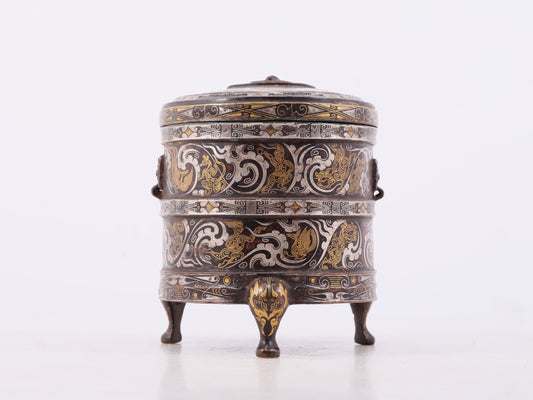 An exquisite bronze inlaid gold and silver tripod jar with auspicious clouds and animal patterns with lid