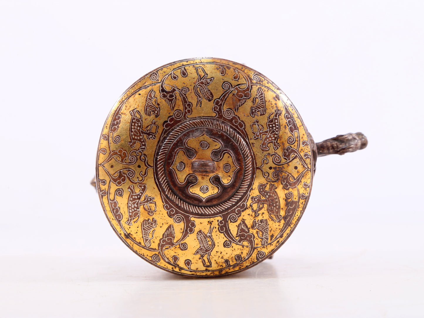 An exquisite bronze inlaid gold and silver tripod jar with auspicious animal patterns and lid