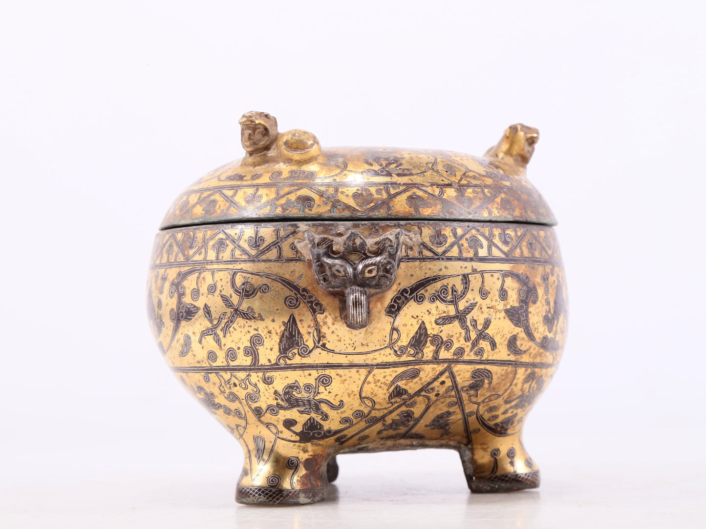 An Archaic Bronze Gold& Silver-Inlaid 'Auspicious Beast' Tripod Jar And Cover